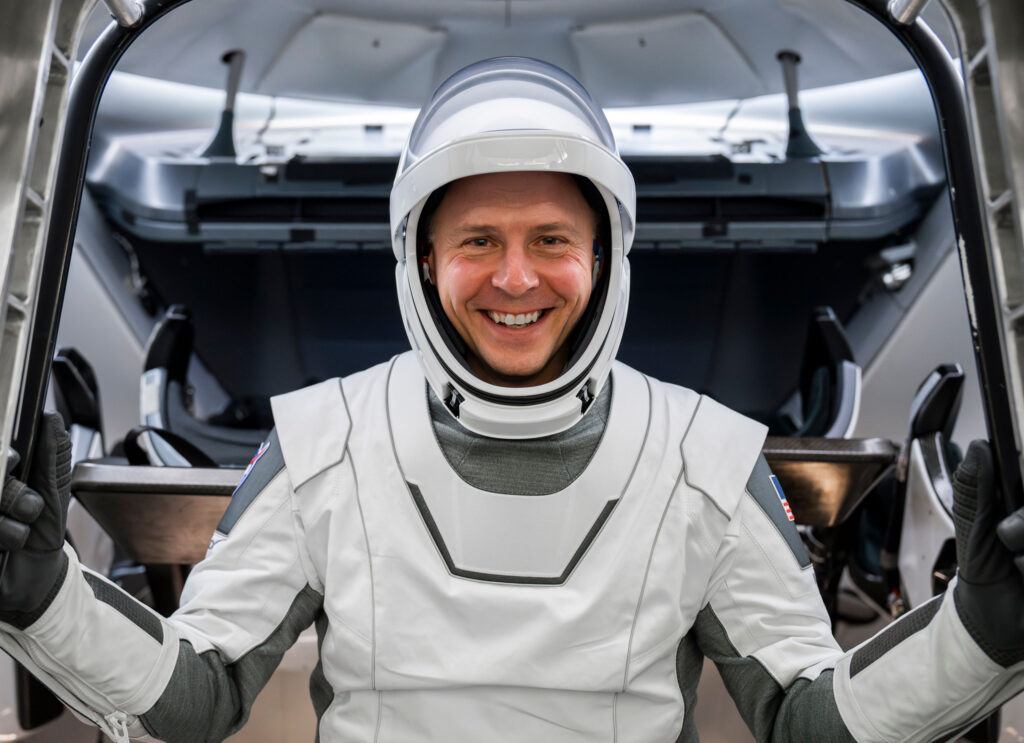 NASA’s SpaceX Crew-9 commander Nick Hague is pictured in his flight suit during training at SpaceX headquarters in Hawthorne, California. Hague will perform human health and performance research on the International Space Station as part of his mission (Credit: SpaceX).